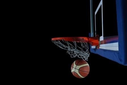 backboard and net on black background in gym indoor